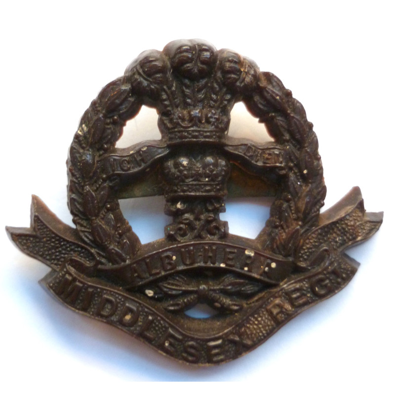 Middlesex Regiment Economy Plastic Cap Badge - British Military Insignia
