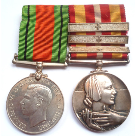 Pair to Miss Joan E.Proctor Red Cross- Defence Medal 1939-45 and Voluntary Medical Service Medal