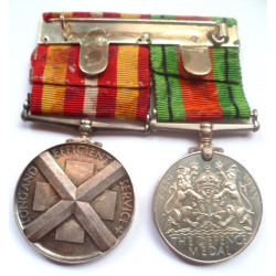 Pair to Miss Joan E.Proctor Red Cross- Defence Medal 1939-45 and Voluntary Medical Service Medal