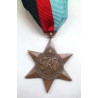 A collection of 1939 - 1945 British Star Medal - British Military Insignia - British Military Insignia