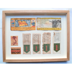 Framed Collection of Vietnam War Safe Conduct Passes and Propaganda Leaflets