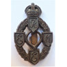 WW2 Royal Electrical Mechanical Engineers Plastic Economy Cap Badge